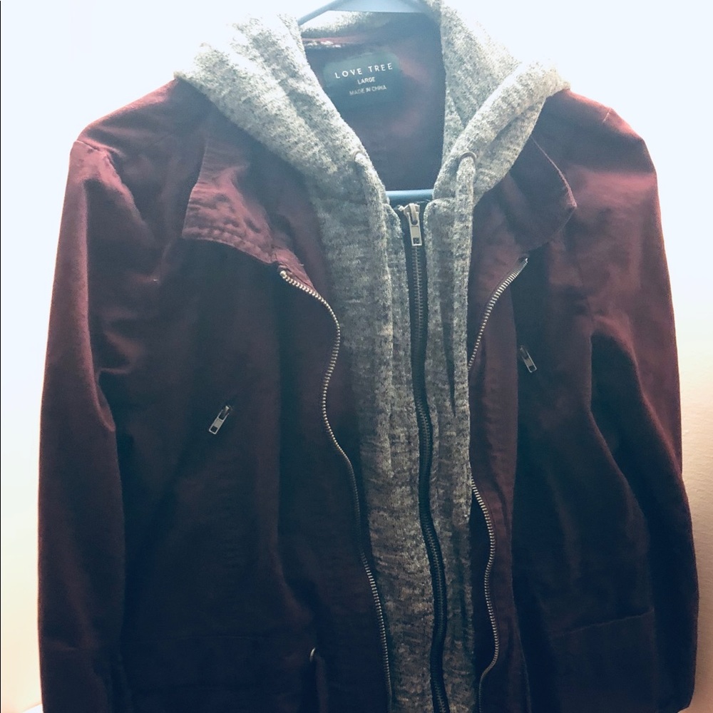 Gray and red zip up